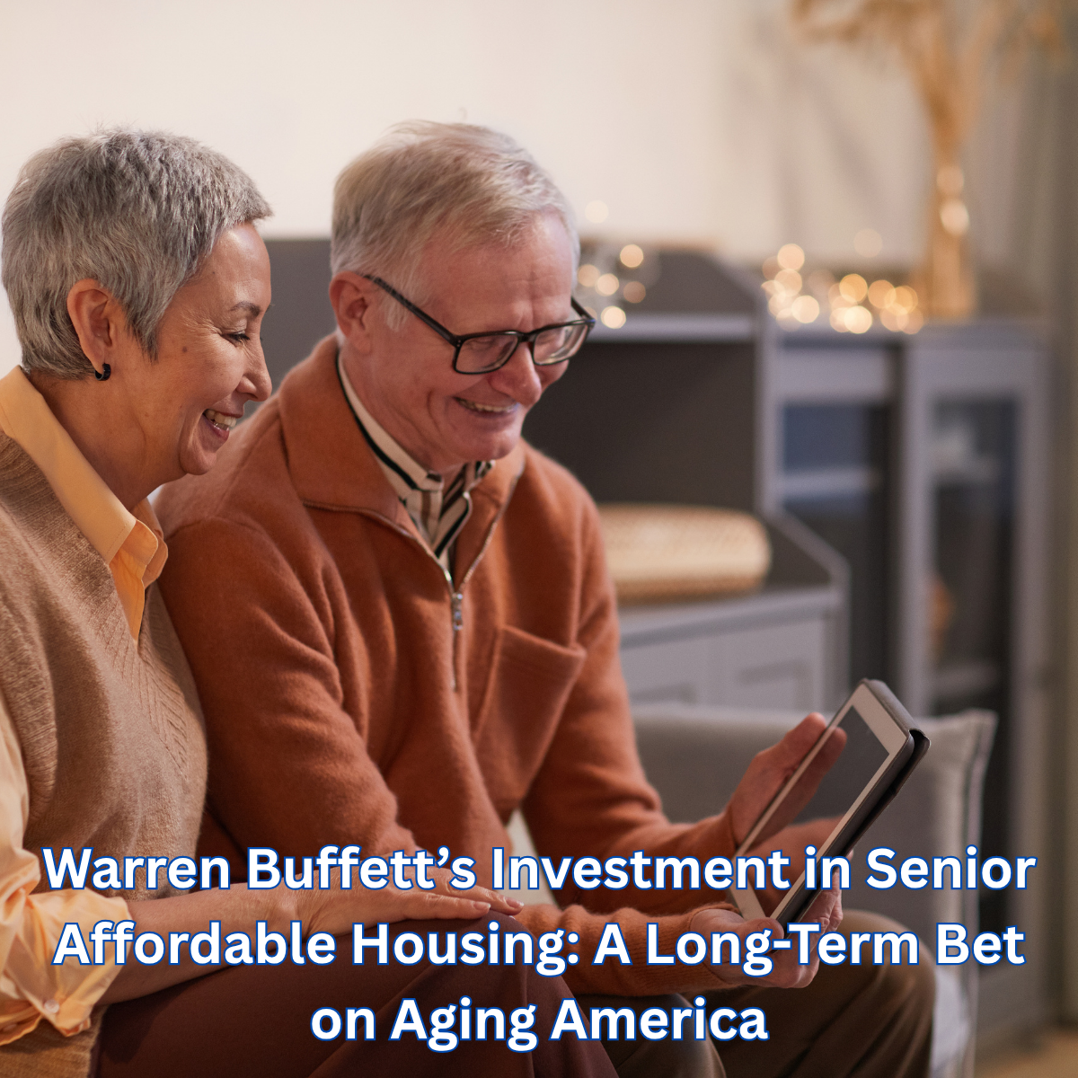 Smiling senior couple sitting together looking at a tablet in a warmly lit living room, symbolizing affordable, dignified housing for aging Americans.